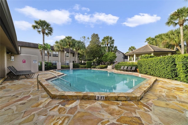 view of pool with a patio area