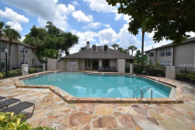 view of pool with a patio area