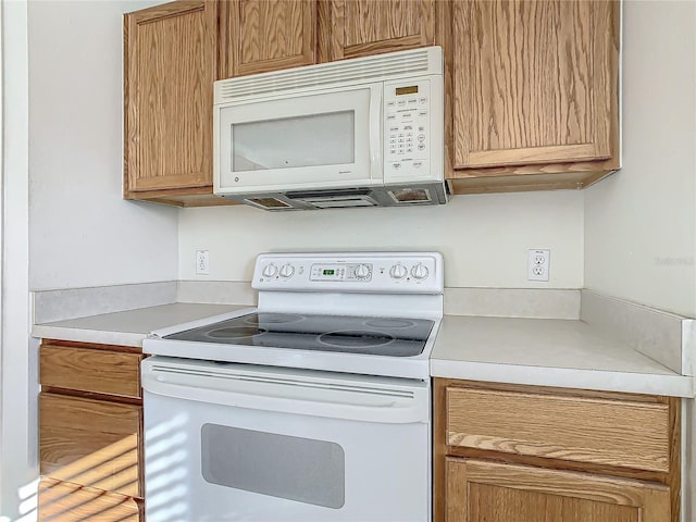 kitchen featuring white appliances