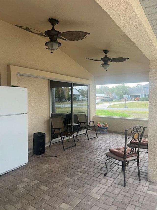 view of patio / terrace featuring ceiling fan