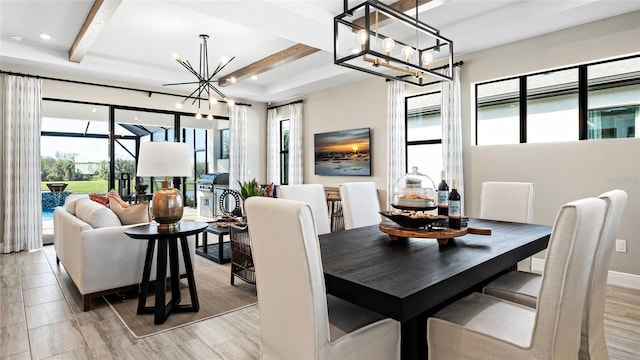 dining space with a notable chandelier and beam ceiling