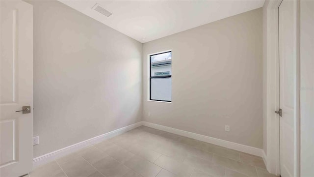 14370 Hammock Oak St, Parrish, FL 34219 - empty room with baseboards and light tile patterned floors
