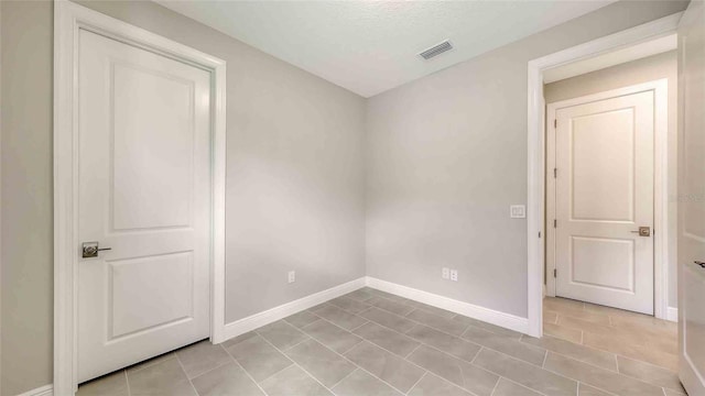 14370 Hammock Oak St, Parrish, FL 34219 - spare room featuring baseboards