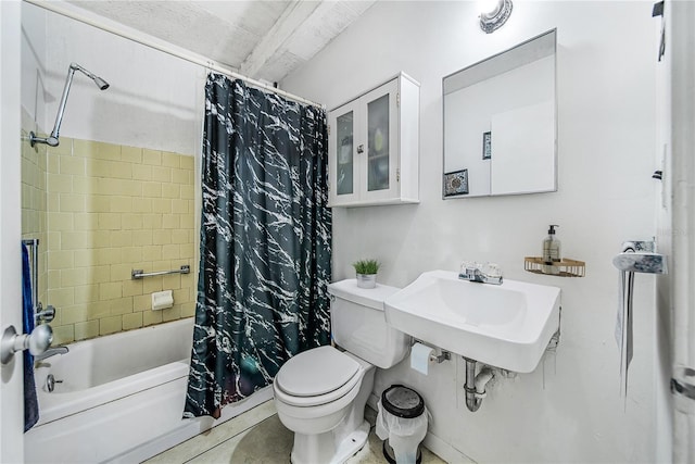 full bathroom featuring shower / bath combination with curtain, toilet, and sink