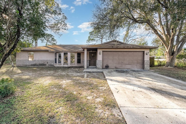 single story home featuring a garage