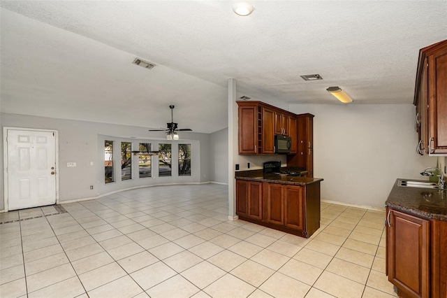 kitchen featuring sink, ceiling fan, dark stone countertops, and black appliances