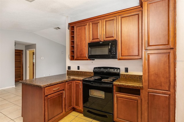 kitchen with kitchen peninsula, dark stone counters, vaulted ceiling, light tile patterned flooring, and black appliances