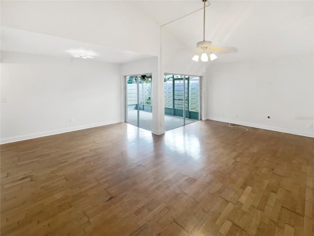 unfurnished room with ceiling fan, high vaulted ceiling, and dark hardwood / wood-style floors