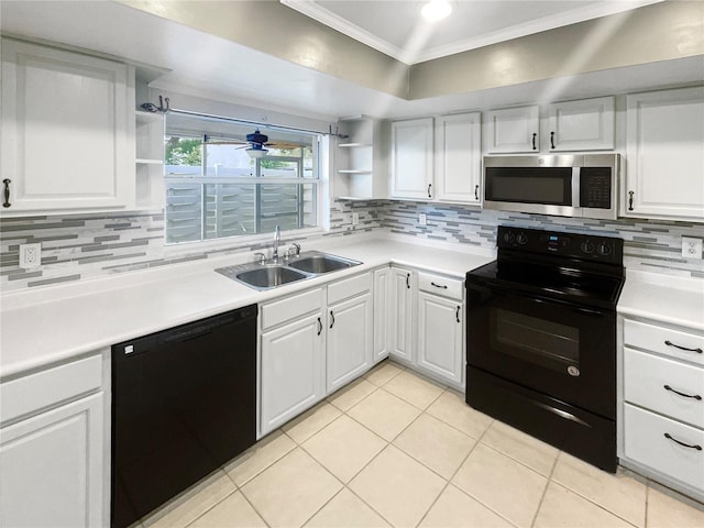 kitchen featuring white cabinetry, sink, crown molding, light tile patterned floors, and black appliances