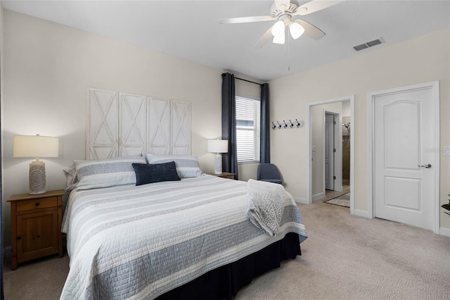 bedroom with ceiling fan and light colored carpet