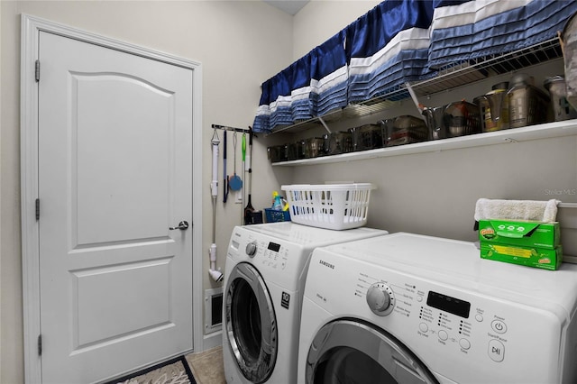 washroom featuring independent washer and dryer