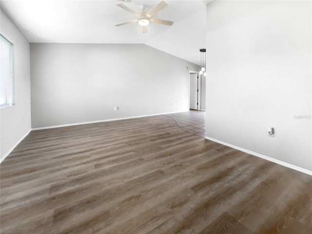 unfurnished living room with dark hardwood / wood-style floors, ceiling fan, and lofted ceiling