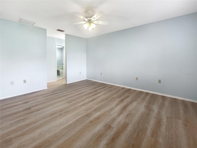 unfurnished room with ceiling fan and light hardwood / wood-style flooring