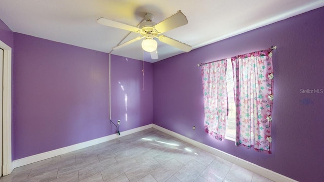 unfurnished room featuring ceiling fan