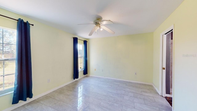 spare room featuring ceiling fan