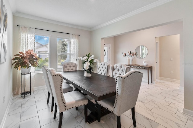 dining space featuring ornamental molding