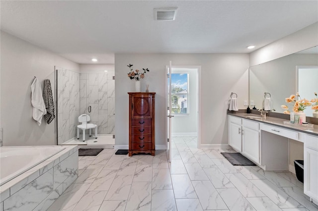 bathroom with vanity and a shower with shower door