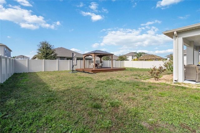 view of yard featuring a gazebo and a deck