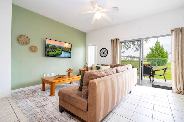 tiled living room featuring ceiling fan