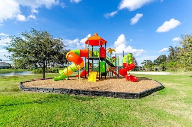 view of playground featuring a water view and a yard