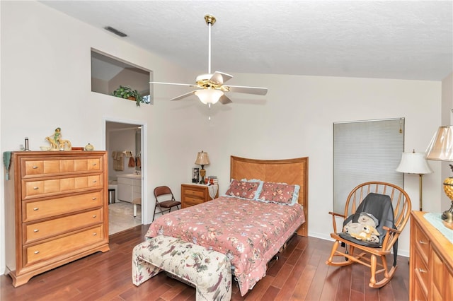 bedroom with a textured ceiling, ceiling fan, dark wood finished floors, and visible vents