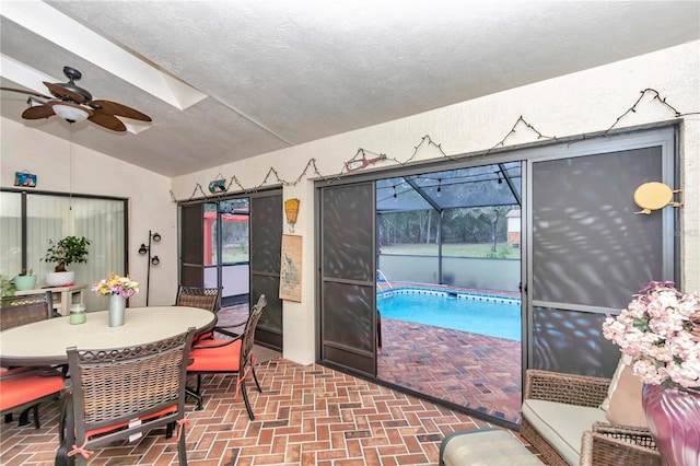 interior space with a ceiling fan