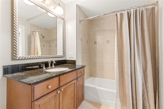 bathroom featuring shower / bathtub combination with curtain, tile patterned flooring, and vanity