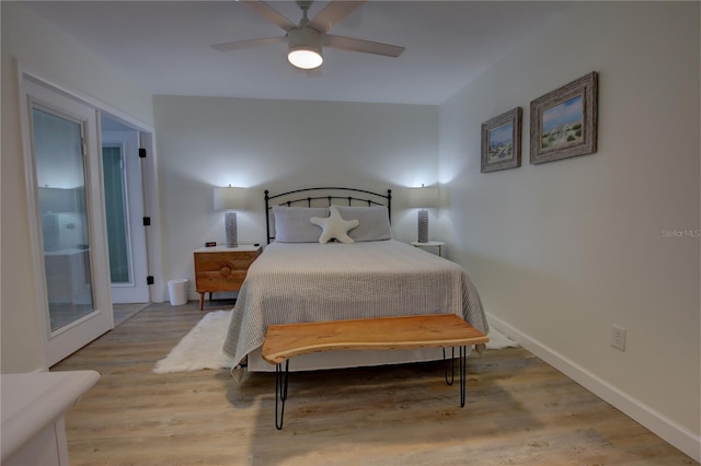 bedroom featuring light wood-type flooring and ceiling fan