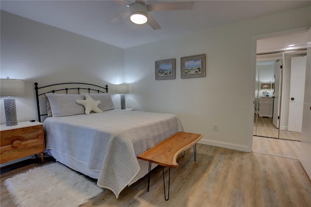 bedroom featuring ceiling fan and light hardwood / wood-style flooring