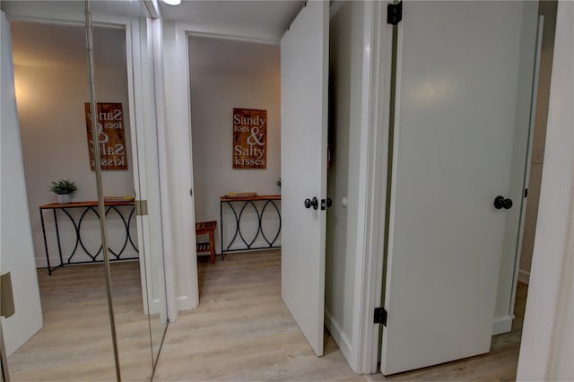 hallway featuring light wood-type flooring