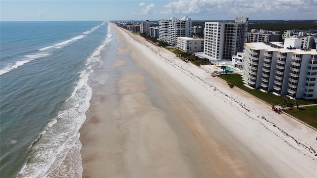 aerial view with a beach view and a water view