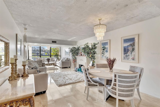 dining space featuring a chandelier