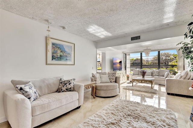 living room with a textured ceiling