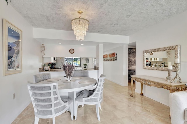 dining area featuring an inviting chandelier