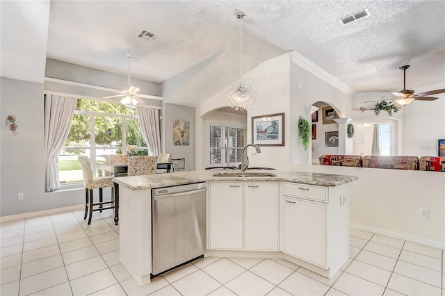 kitchen featuring a center island with sink, sink, stainless steel dishwasher, a textured ceiling, and white cabinetry