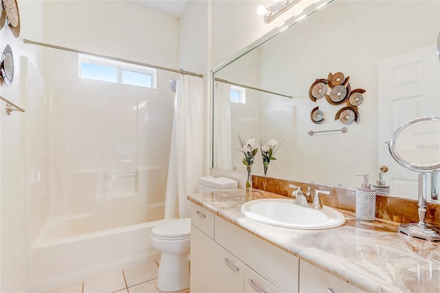 full bathroom featuring tile patterned floors, vanity, toilet, and shower / tub combo with curtain