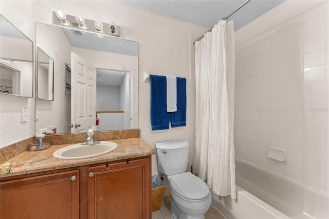 full bathroom featuring tile patterned flooring, shower / bath combo, vanity, and toilet