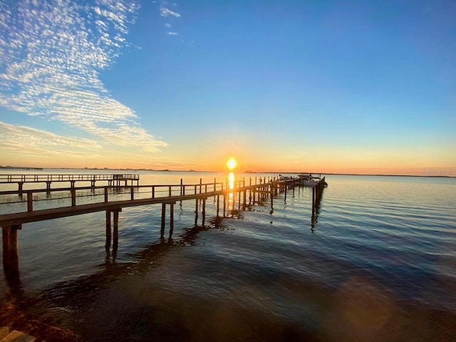 view of dock with a water view