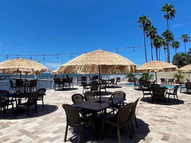 view of patio with a community pool