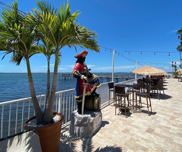 view of patio featuring a water view