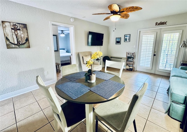 tiled dining room with french doors