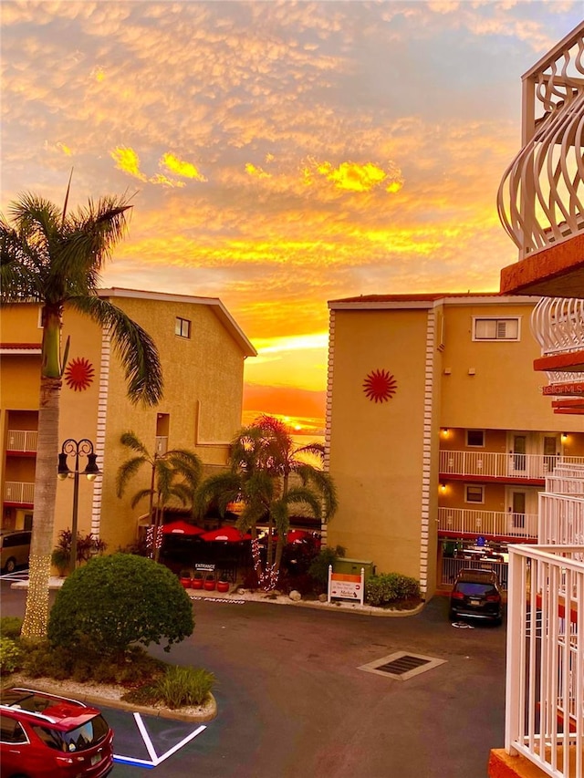 view of outdoor building at dusk