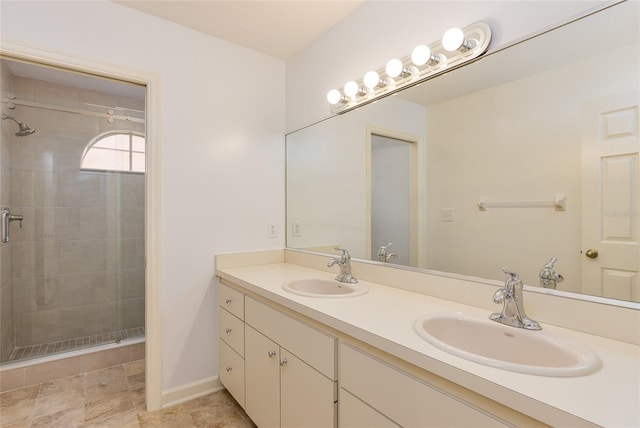 bathroom with vanity and walk in shower