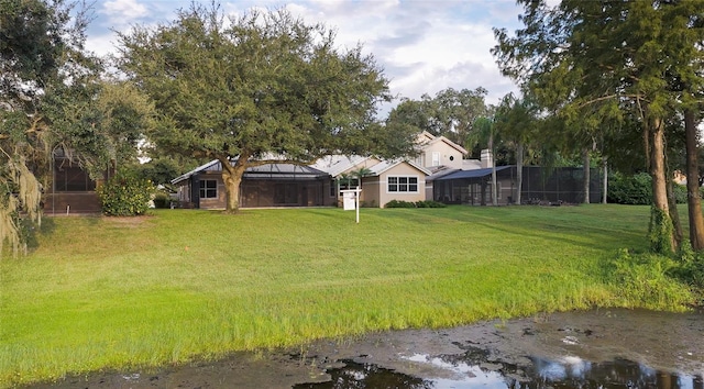 view of yard with a lanai