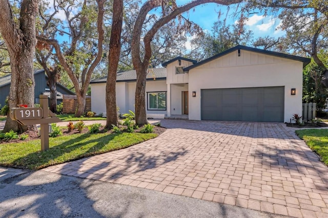 view of front of property with a garage