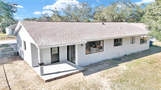 rear view of property with a patio