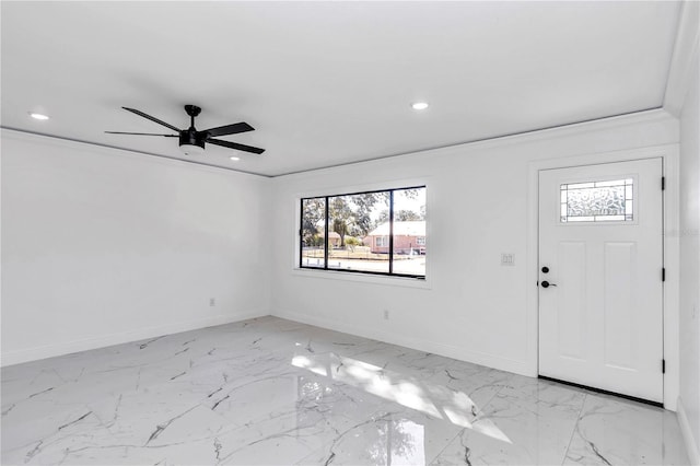 entryway with crown molding and ceiling fan