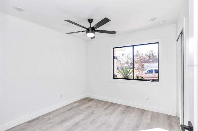 unfurnished room featuring ceiling fan and light hardwood / wood-style floors