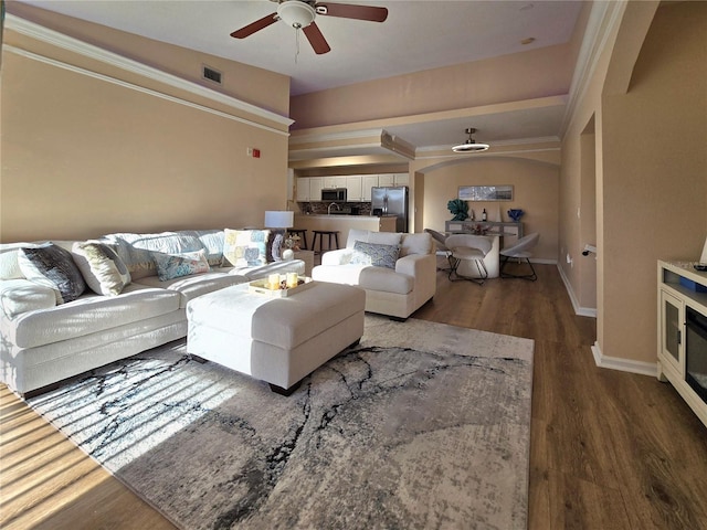 living room featuring ceiling fan, dark hardwood / wood-style flooring, and lofted ceiling