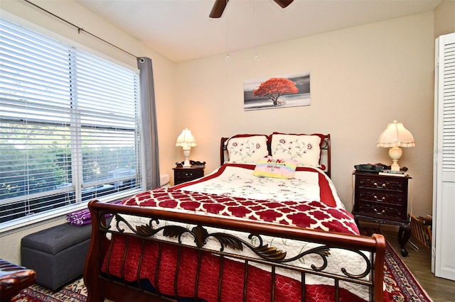 2740 Maitland Crossing Way Unit 1, Orlando, FL 32810 - bedroom with multiple windows, wood finished floors, and ceiling fan